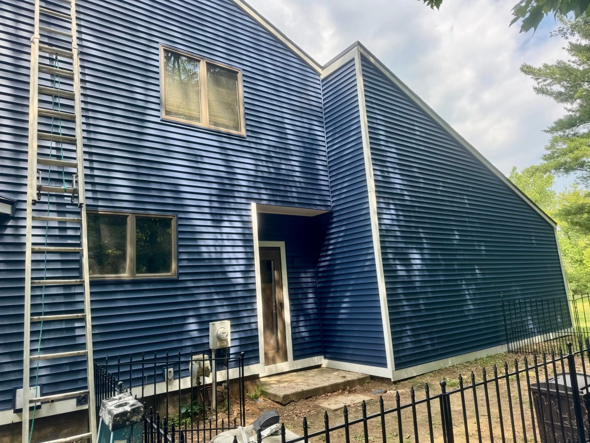 Navy siding & white trim